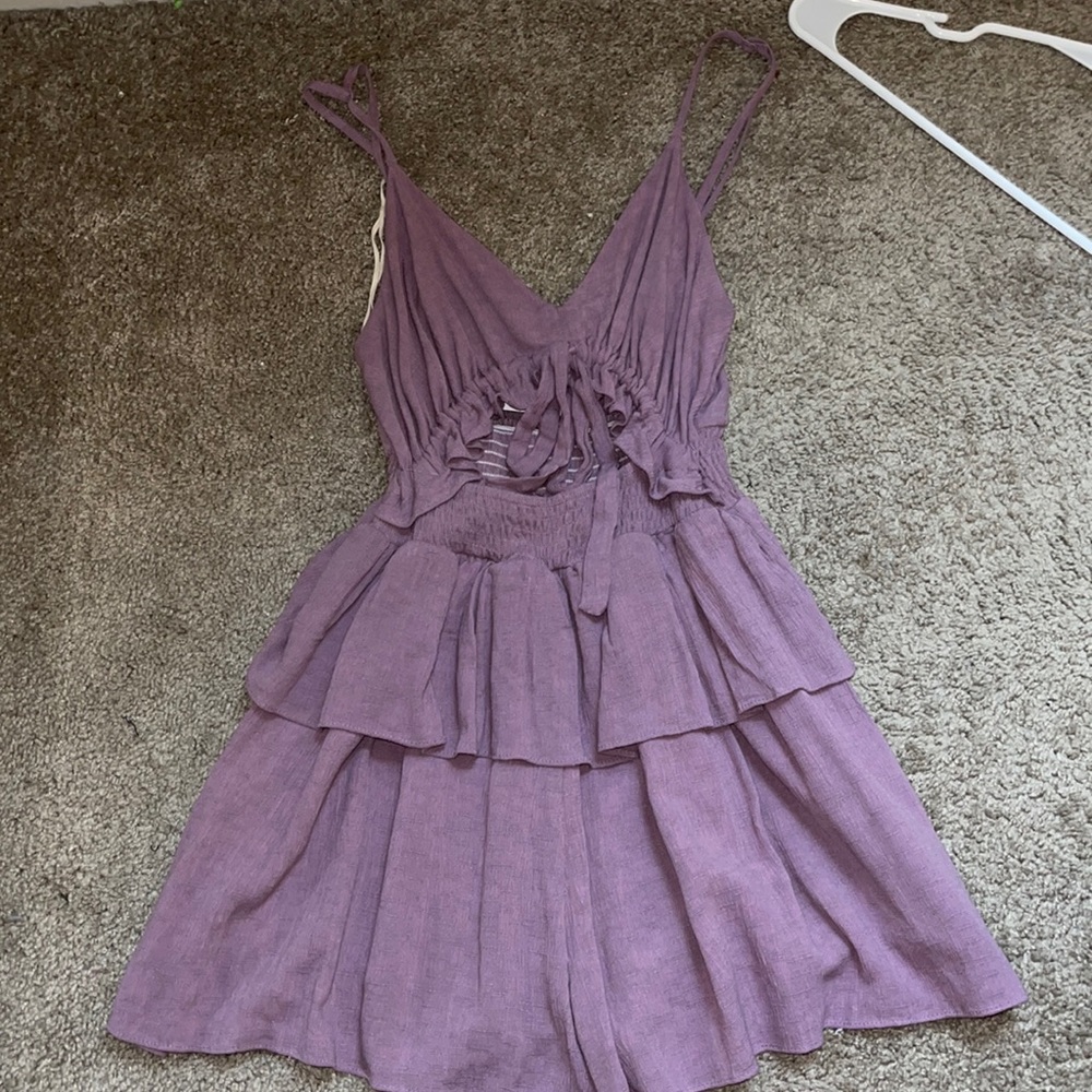 Romper with front cut out and bow detail